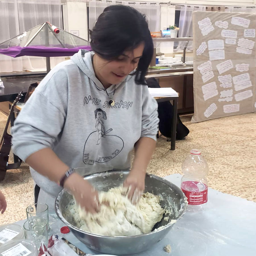 Elisheva, a Ramat Hadassah Youth Village resident, preparing a meal